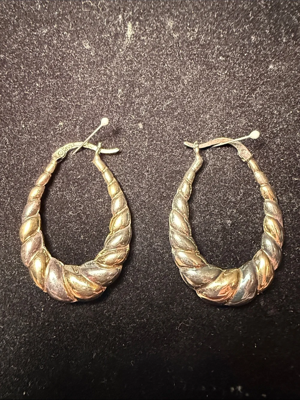 Monet Two-Tone Twisted Hoop Earrings in Gold and Silver